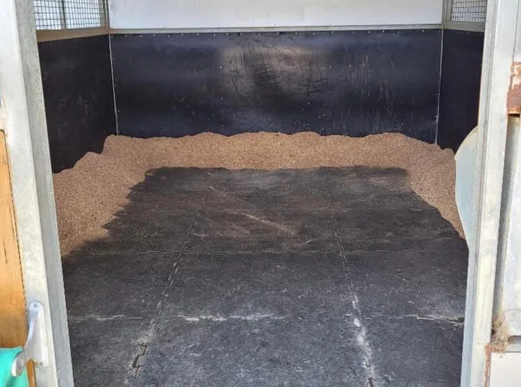 Rubber stable mats laid in a stall